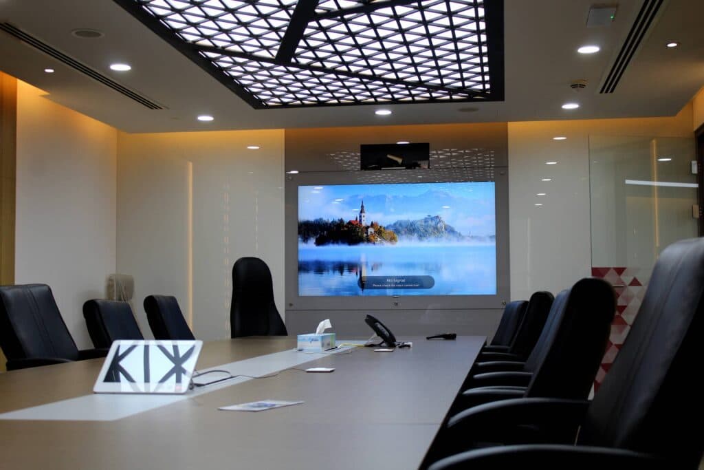 Lacquered back painted glass with concealed TV