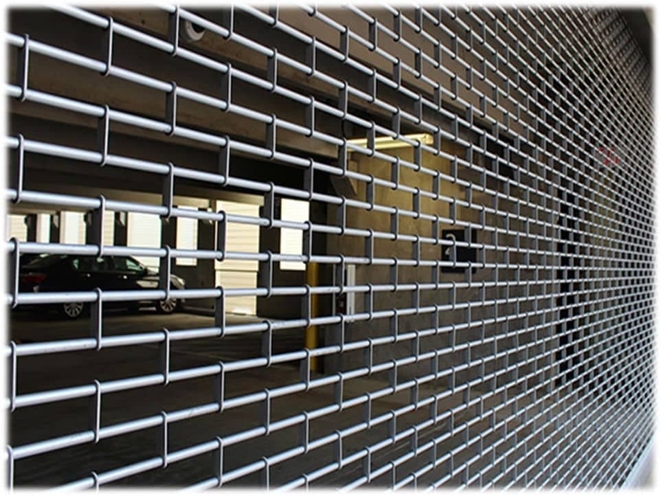 Grill type rolling shutter